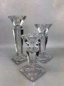 Three modern cut glass graduating candleholders, the tallest approx 30.5cm, the smallest A/F