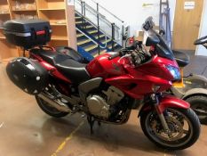 Honda CBF 1000F (07, 26,981 miles) serviced this year with new sprockets and chain. Aftermarket