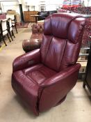 Red leather recliner / rocker armchair