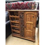 Carved wooden wine rack with single cupboard