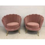 Pair of modern Art-Deco style pink velvet scalloped back chairs with brass coloured legs, approx