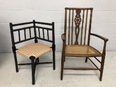 Two low chairs one of bobbin design the other with rush woven seat.