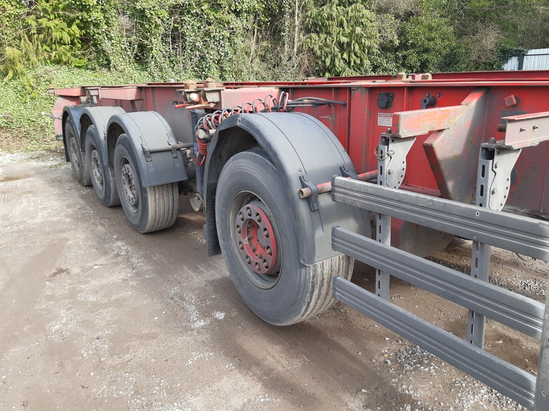 Red Dennison Four Axle (one drop axle) Multifunction Skeletal Trailer (2006)