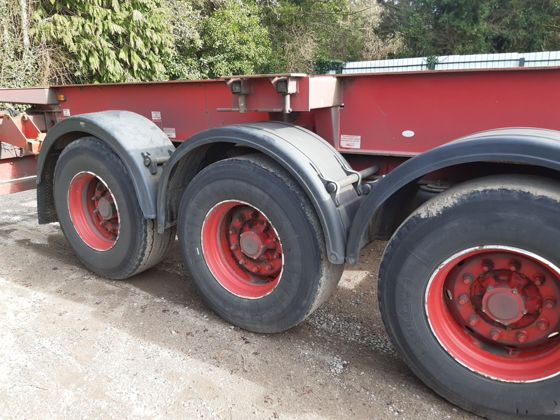 Red Dennison Three Axle (40ft) Sliding Skeletal Trailer (2004)