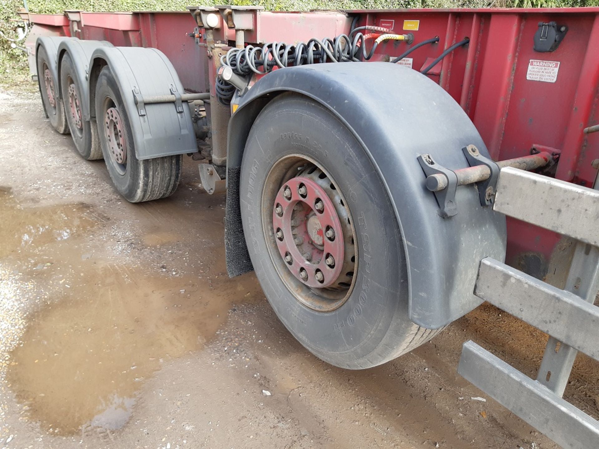 Red Dennison Four Axle (one drop axle) Multifunction Skeletal Trailer (2006) - Image 7 of 14