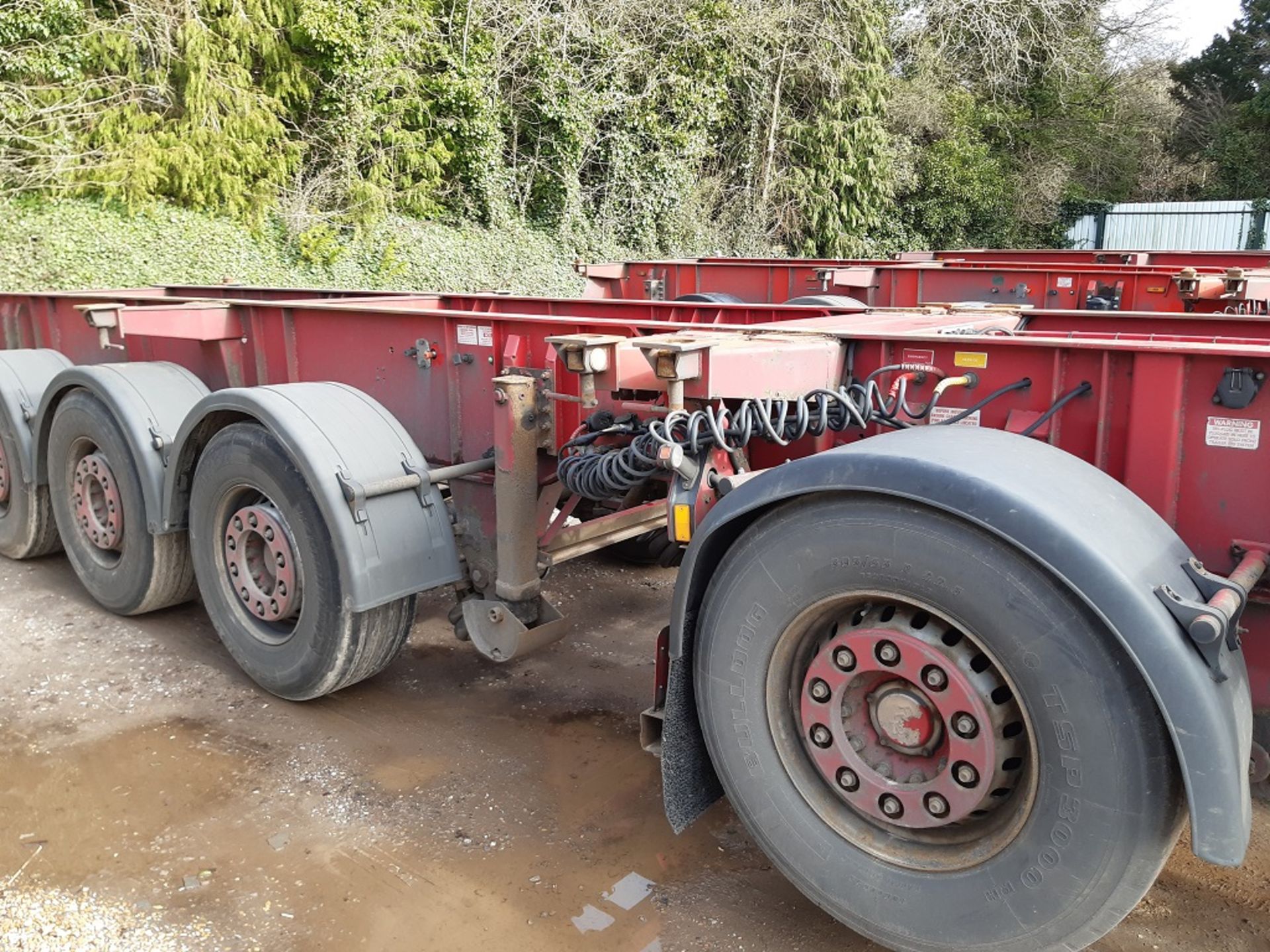 Red Dennison Four Axle (one drop axle) Multifunction Skeletal Trailer (2006) - Image 2 of 14