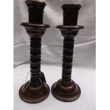 Pair of twist stemmed oak candlesticks