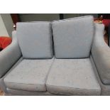 2 seater drop end settee upholstered in patterned Cambridge blue contemporary cloth