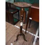 Delicate oak circular topped display stand the twist stemmed support on tricorn base