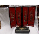 A small black painted 4 fold rectangular oriental screen and a smaller rectangular playing card box