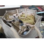 Brown canvas holdall containing an unused Flax jacket, quantity of pouches,