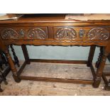 Rectangular topped console table fitted 2 carved fronted drawers