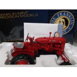 Franklin Mint precision model of a McCormick Farmall Tractor (Guide Price £50-£60) FLY FISHERMANS
