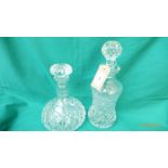 Port decanter on circular plated tray and a spirit decanter with golf ball stopper