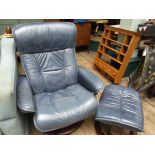 Easy fireside chair and matching stool upholstered in light blue leather
