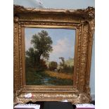 Landscape oil in ornate gilt frame of a pair of Shires pulling a haycart beside stream