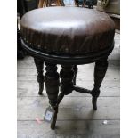 Circular topped stool on 4 splayed turned legs,