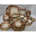 Early 20th century Phoenix ware part tea, coffee and part dessert service,