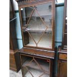 Mahogany display cupboard, the upper portion with diamond shaped glazed panel with 2 shelves behind,