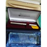 Double string of Lotus pearls in presentation box and a Hargreaves Landsdowne fountain pen in