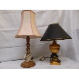 Oak twist stemmed table lamp with pink parchment shade and another gold based table lamp with black