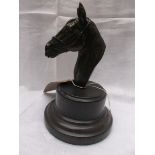 Bronze horse head signed Stevens on circular black marble plinth