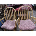 4 polished pine Windsor style armchairs each with 6 vertical sticks to back,