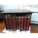 Freestanding revolving mahogany bookcase incl. 14 vols.