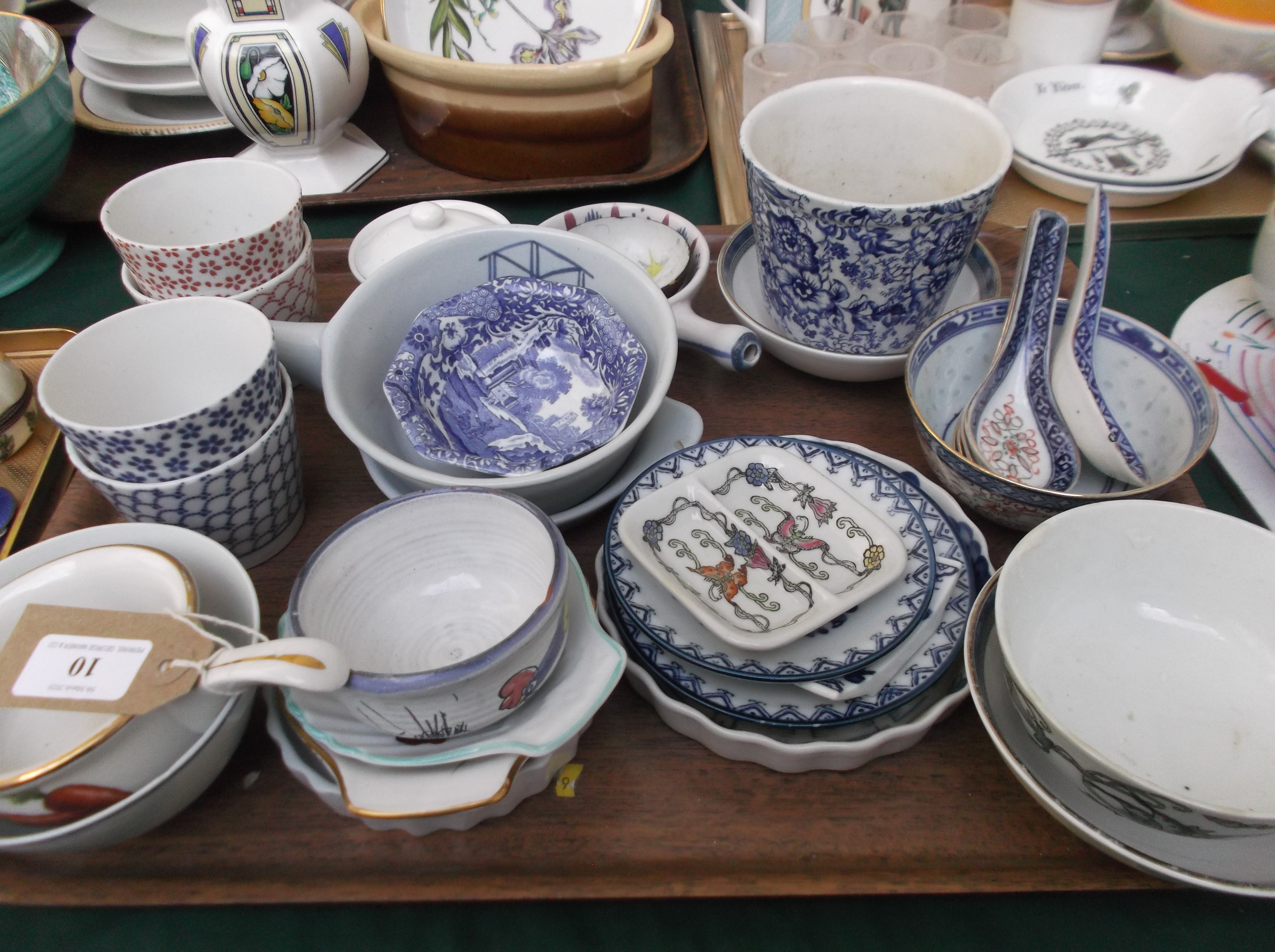 Selection of principally blue and white oriental bowls and spoons from various factories,