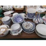 Selection of principally blue and white oriental bowls and spoons from various factories,