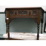 Oak telephone table fitted single drawer with carved front and circular drop handle