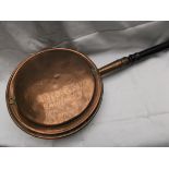 Copper warming pan with long turned handle