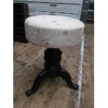 Victorian piano stool on tricorn base,