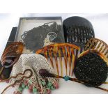 Small box of tortoise shell and other hair combs, loose jet bead work,