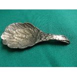 Feathered oval caddy spoon (London 1977)