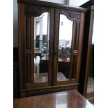 20th century double wardrobe fitted 2 bevel edged rectangular mirrored doors with carved foliate