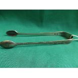 Pair of silver sugar tongs believed George II (hallmark illegible)