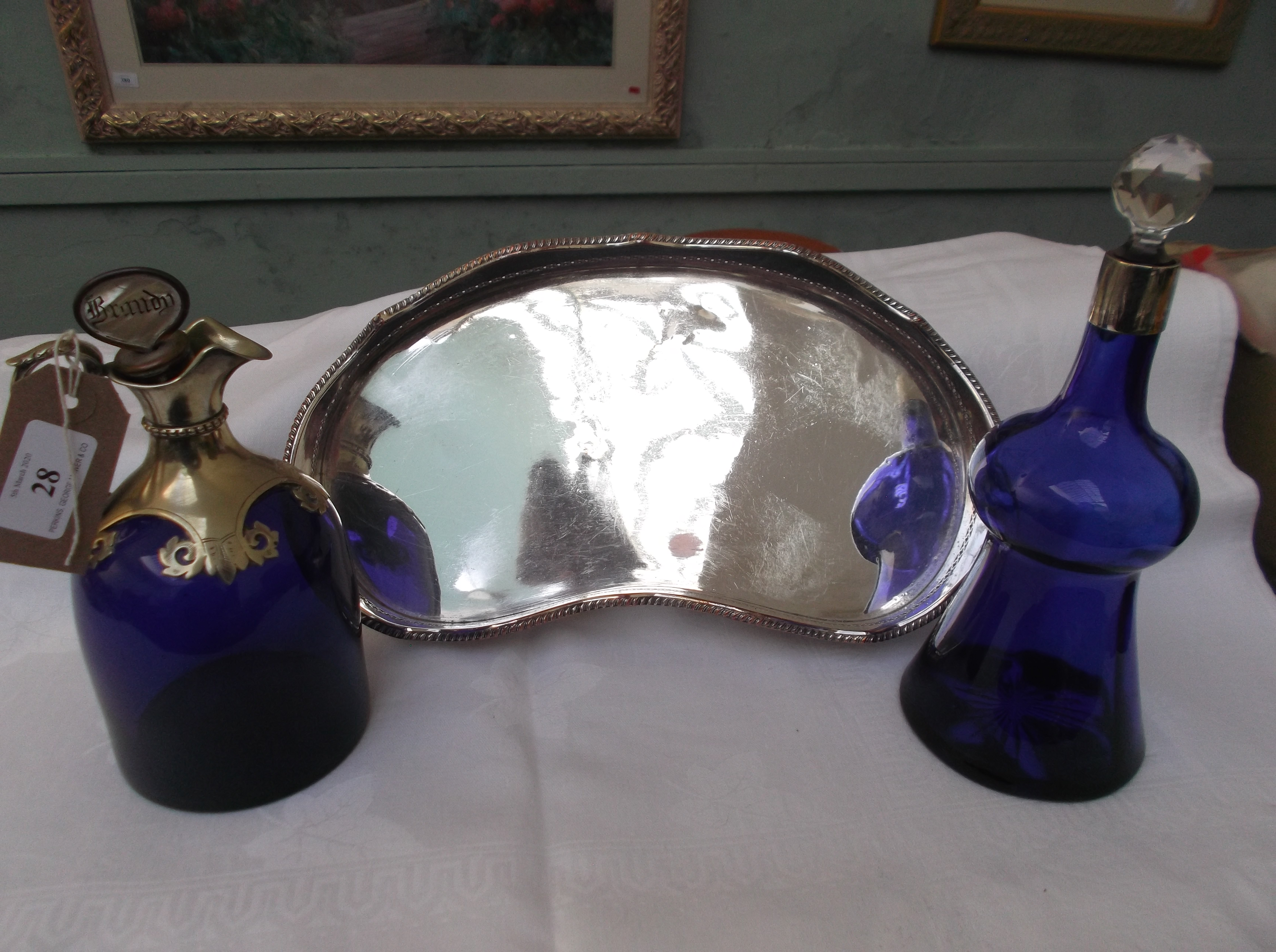 2 Cobalt blue glass spirit decanters each with plated mounts,