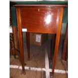 Edwardian inlaid mahogany needlework box and contents on tapering legs on castors