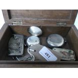 Carved oak jewellery box containing 2 silver cased fob watches, plated wire mesh purse,