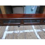 Long rectangular mahogany display cabinet,