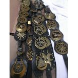 5 Leather straps containing a selection of early brasses incl.