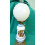 Oil lamp with domed clouded glass shade,