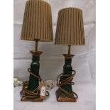 Pair of green pot based table lamps each with parchment shade