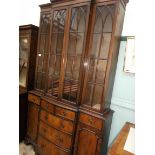 Mahogany display cupboard the upper portion with 4 astragal glazed doors with shelves behind,