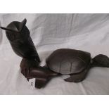 3 carvings, each of a tortoise,