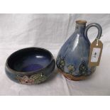 Blue ground Doulton Lamdbeth fruit bowl and a handled specimen vase in the shape of an oil bottle
