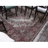 Large beige and port ground lounge carpet,