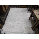 As new cream wool hearth rug (64" x 48")