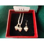 Heart shaped set of necklace and drop earrings